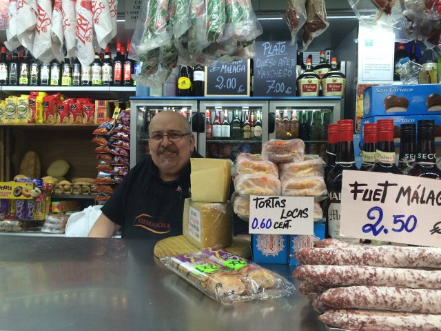 Trying cured meats in the Atarazanas Market with Devour Malaga