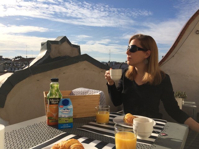 Abby having breakfast on the balcony at Eric Vökel Madrid Suites